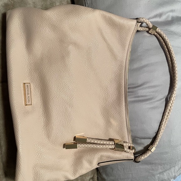 Michael Kors Handbags - Authentic Pink like new Michael Kors bag with tag